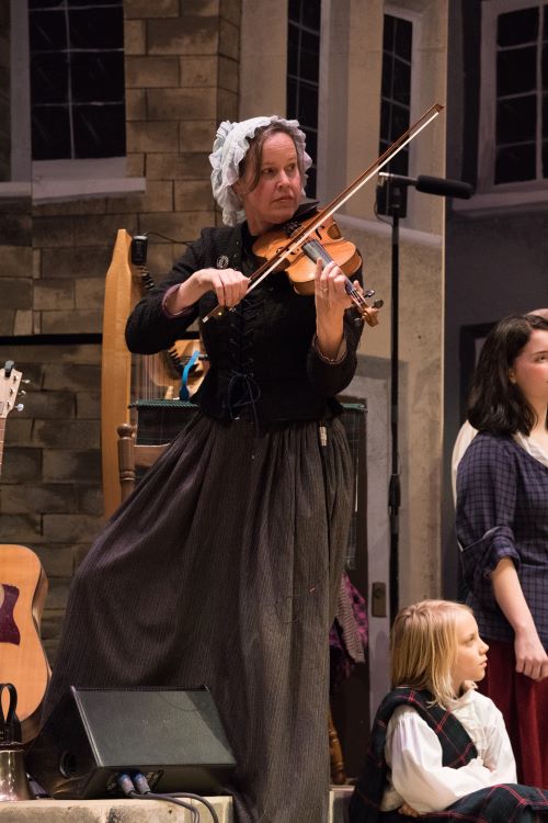 Holding up a Star in Revels Production